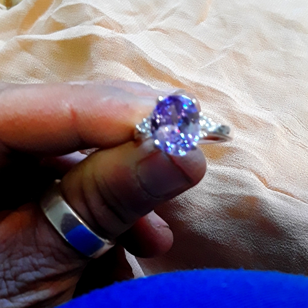 Elegant Silver and Purple Gemstone Ring